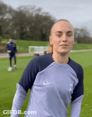 Woman In Blue Nike Shirt Number 5 GIF