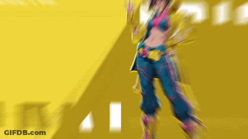 Woman In Blue Pants And Yellow Jacket GIF