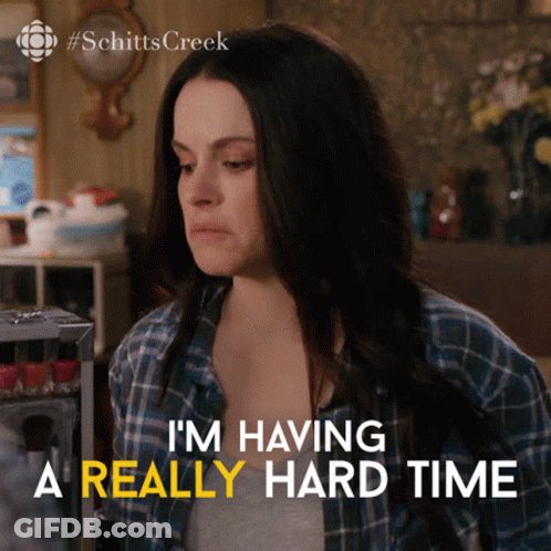 Woman In Blue Plaid Shirt Says Having A Really Hard Time GIF