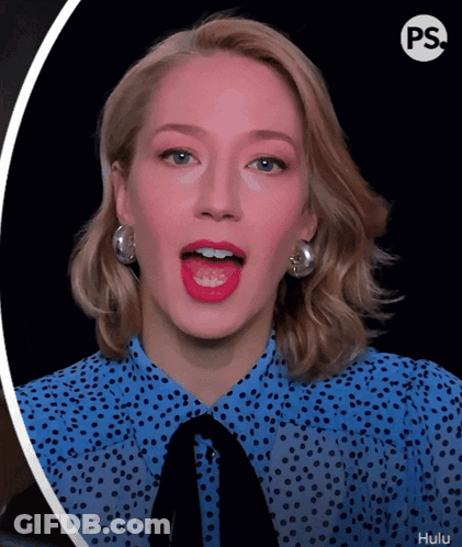 Woman In Blue Polka Dot Shirt Tongue Out GIF