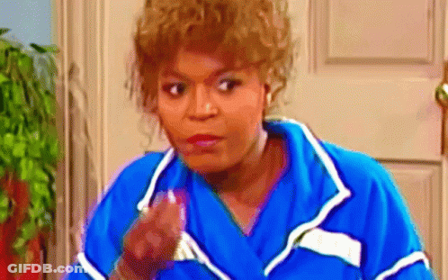 Woman In Blue Robe Making Funny Face GIF