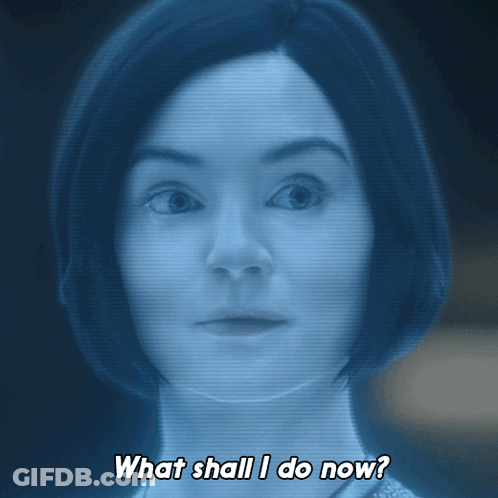 Woman In Blue Saying What Shall I Do GIF