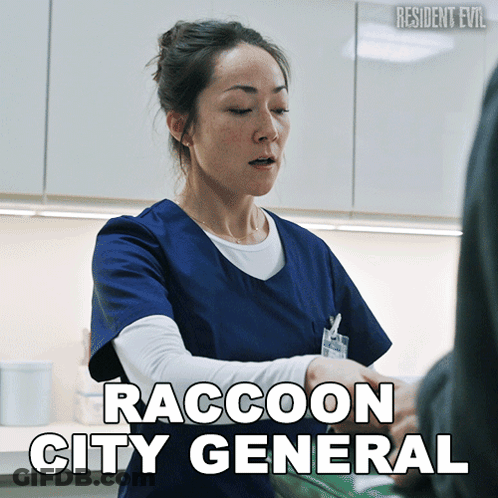 Woman In Blue Scrub Talking To Man Raccoon City General GIF