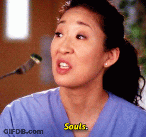 Woman In Blue Scrub Top Talking Into Microphone Says Souls GIF