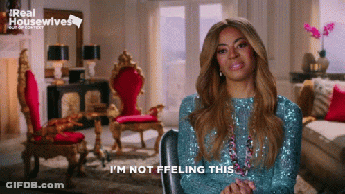 Woman In Blue Sequined Top Saying I'm Not Feelin' This GIF