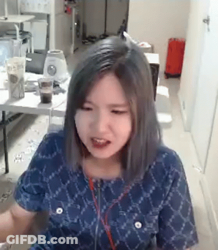 Woman In Blue Shirt And Headphones GIF