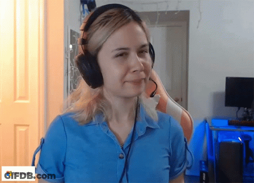 Woman In Blue Shirt And Headphones With Microsoft Logo GIF