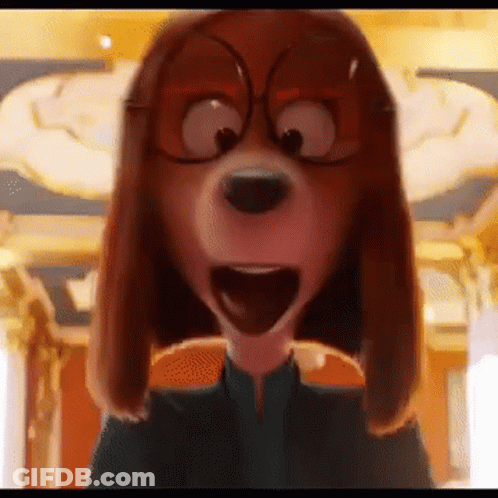 Woman In Blue Shirt And Necklace In Front Of Castle GIF