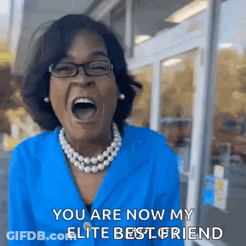 Woman In Blue Shirt And Pearls Screaming GIF