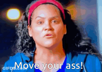 Woman In Blue Shirt And Pink Headband Saying Move Your Ass GIF