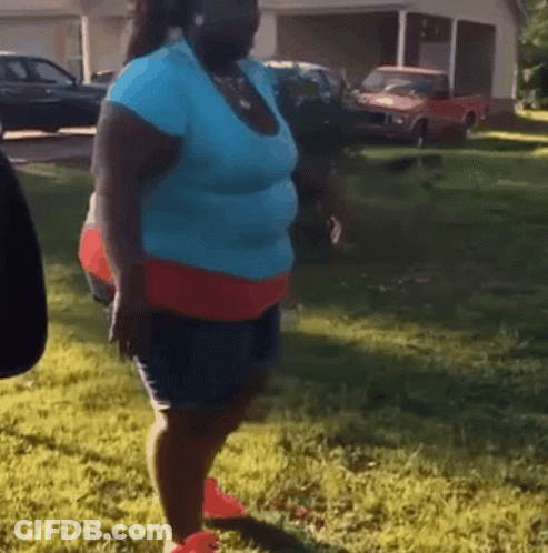 Woman In Blue Shirt And Red Shorts GIF