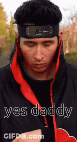 Woman In Blue Shirt And Yellow Headband Saying Yes Daddy GIF