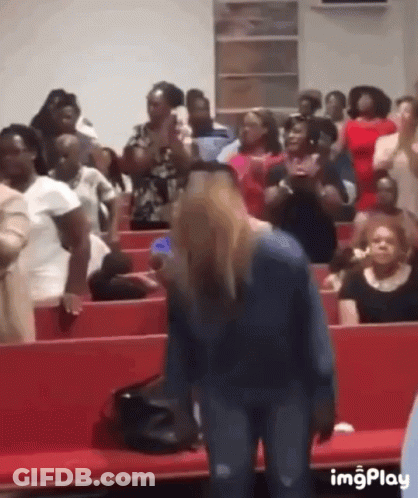 Woman In Blue Shirt Before Church Crowd GIF