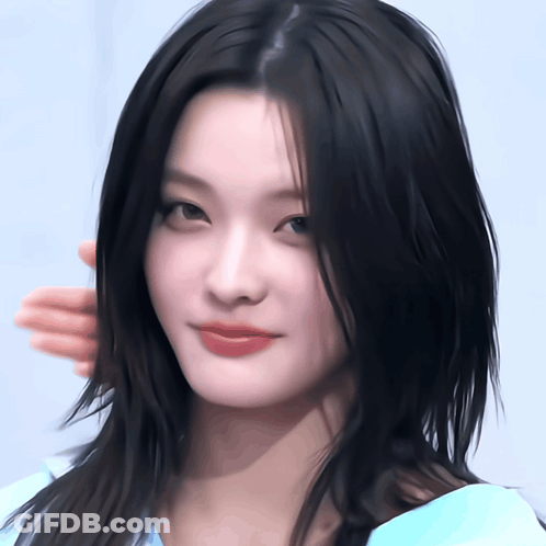 Woman In Blue Shirt Close Up GIF