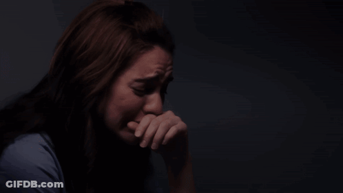 Woman In Blue Shirt Crying GIF
