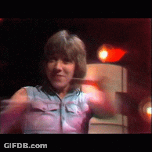 Woman In Blue Shirt Dancing GIF