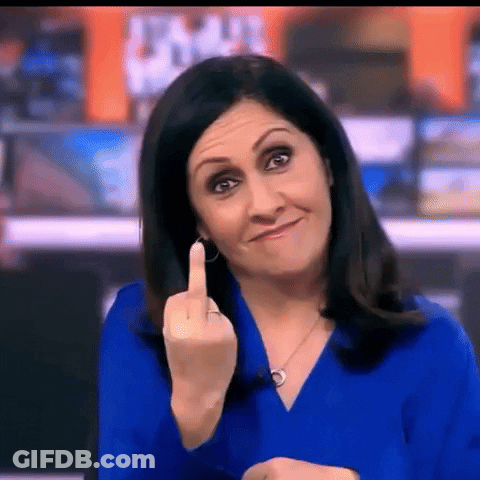 Woman In Blue Shirt Giving Middle Finger GIF