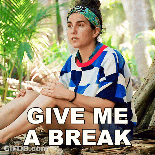 Woman In Blue Shirt Making Funny Face Another Woman Watches GIF