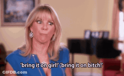 Woman In Blue Shirt Making Funny Face Saying Bring It On Girl Bring It On Bitch GIF