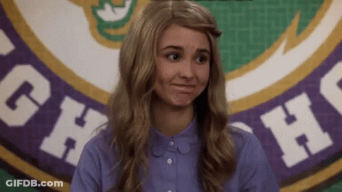 Woman In Blue Shirt Making Funny Face With CH Banner GIF