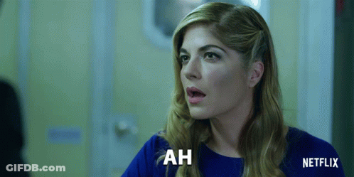 Woman In Blue Shirt Saying Ah Netflix Ad GIF