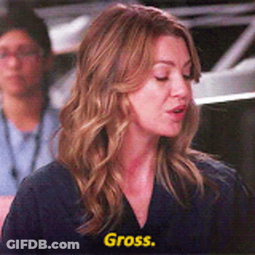 Woman In Blue Shirt Saying Gross In Yellow GIF