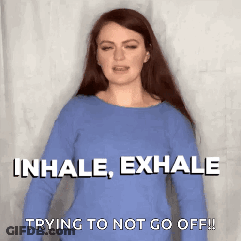Woman In Blue Shirt Saying Inhale Exhale GIF