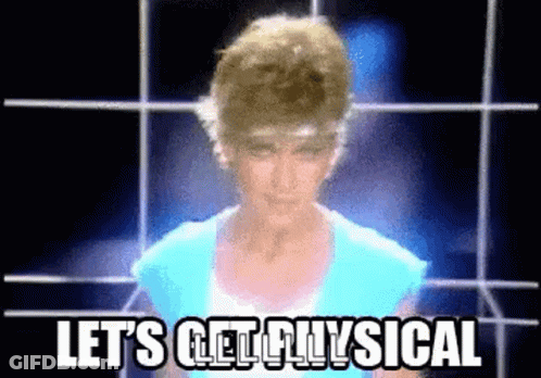 Woman In Blue Shirt Saying Lets Get Physical GIF