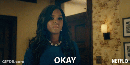 Woman In Blue Shirt Saying Okay Netflix Ad GIF