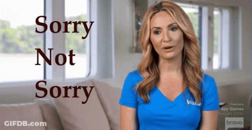 Woman In Blue Shirt Saying Sorry Not Sorry GIF
