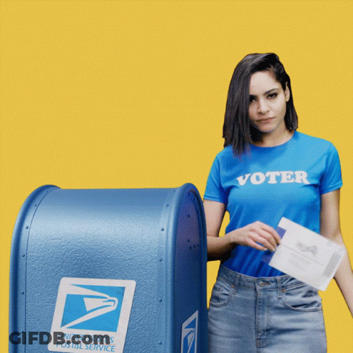 Woman In Blue Shirt Saying Voter Putting Ballot Into Mailbox GIF