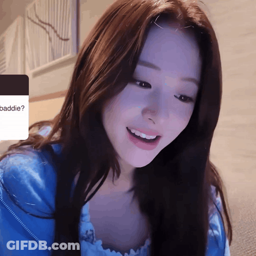 Woman In Blue Shirt Smiling At Baddie Screen GIF