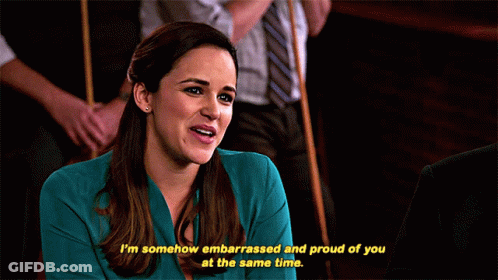 Woman In Blue Shirt Smiling Embarrassed And Proud Of You GIF