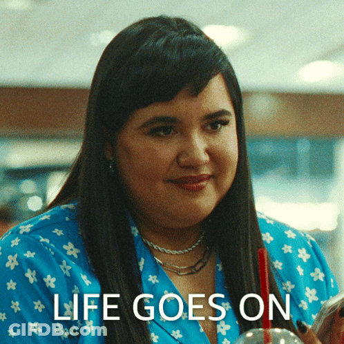 Woman In Blue Shirt Smiling Life Goes On GIF