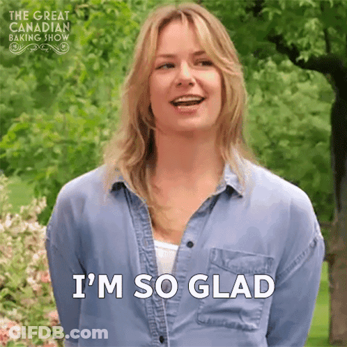 Woman In Blue Shirt Smiling Says I'm So Glad GIF