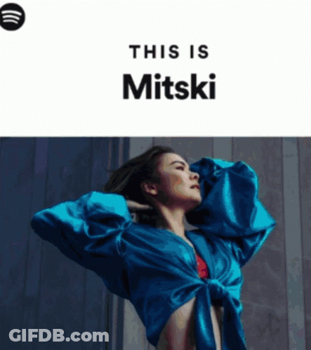 Woman In Blue Shirt Spotify Advertisement GIF