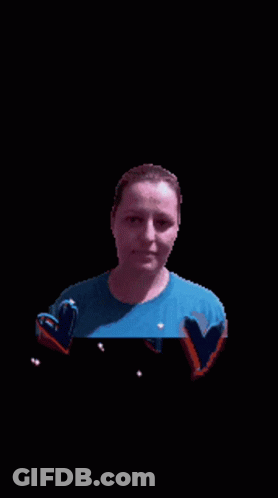 Woman In Blue Shirt Surrounded By Bubbles And Hearts GIF