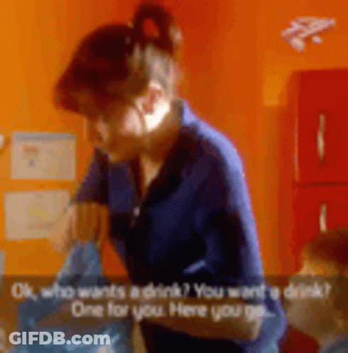 Woman In Blue Shirt Talking To Child Wanting Drink GIF