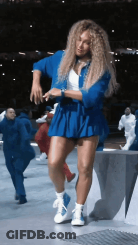 Woman In Blue Skirt Dancing GIF