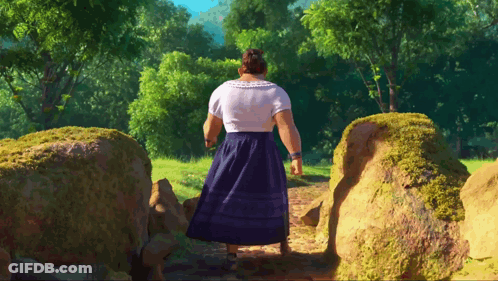 Woman In Blue Skirt Walking Through Field GIF