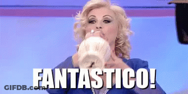 Woman In Blue Suit Blowing Balloon Fantastico GIF