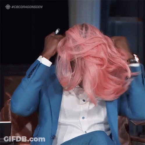 Woman In Blue Suit Pink Hair GIF