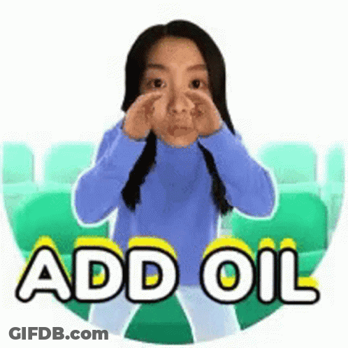 Woman In Blue Sweater Covering Nose Saying Add Oil GIF
