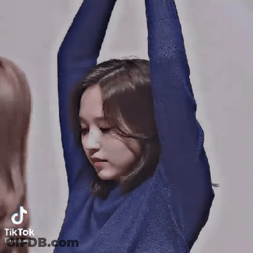 Woman In Blue Sweater Dancing With Microphone GIF