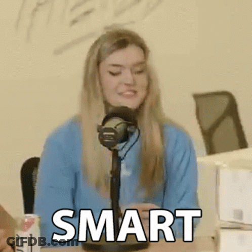 Woman In Blue Sweater Saying Smart GIF
