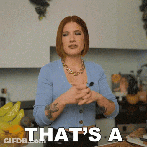 Woman In Blue Sweater Saying That's A In Kitchen GIF