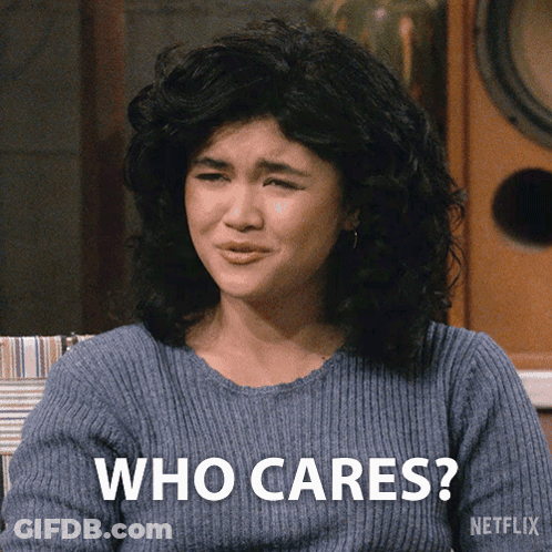 Woman In Blue Sweater Says Who Cares GIF
