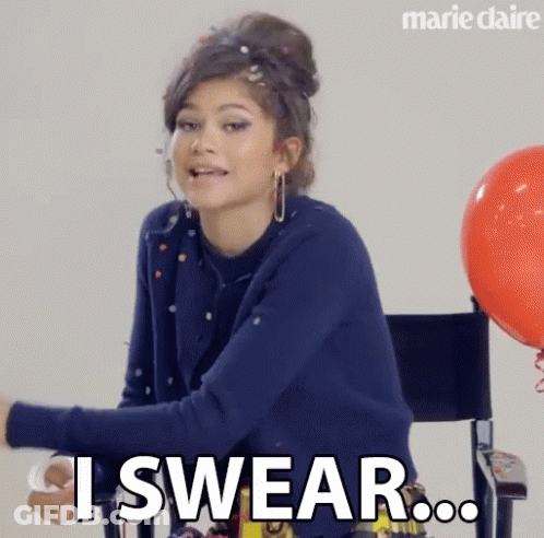 Woman In Blue Sweater Sitting With Balloons Says I Swear GIF