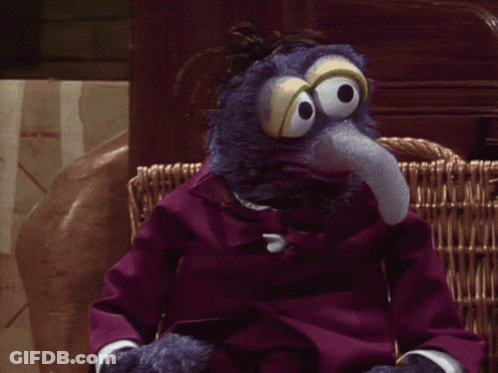 Woman In Blue Sweater Talking About Tuesday GIF