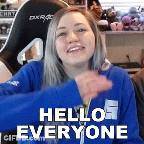 Woman In Blue Sweatshirt Saying Hello Everyone GIF